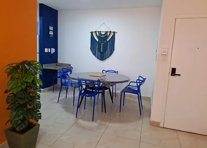 Apartamento Guarujá Enseada Caravela - próximo da praia - com ar condicionado e vaga para carro